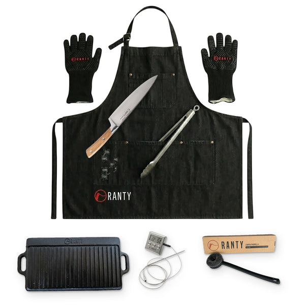 Pack Gran Asador RANTY negro: delantal jeans, guantes, cuchillo Chef, tenaza, plancha de hierro fundido, termómetro digital y limpiador de parrillas