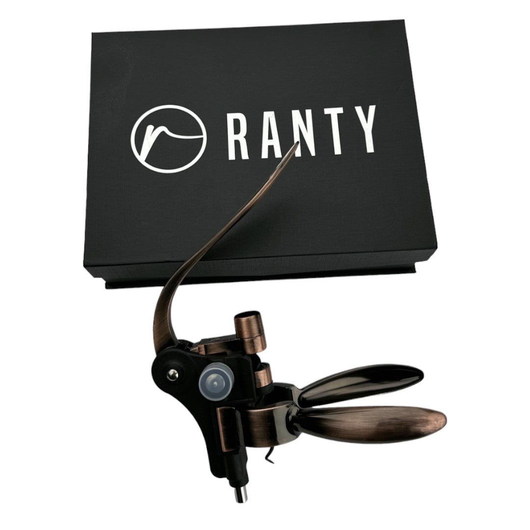 Sacacorchos Rabbit Ranty con acabado bronce y negro, presentado con su caja de regalo premium con logo de la marca.