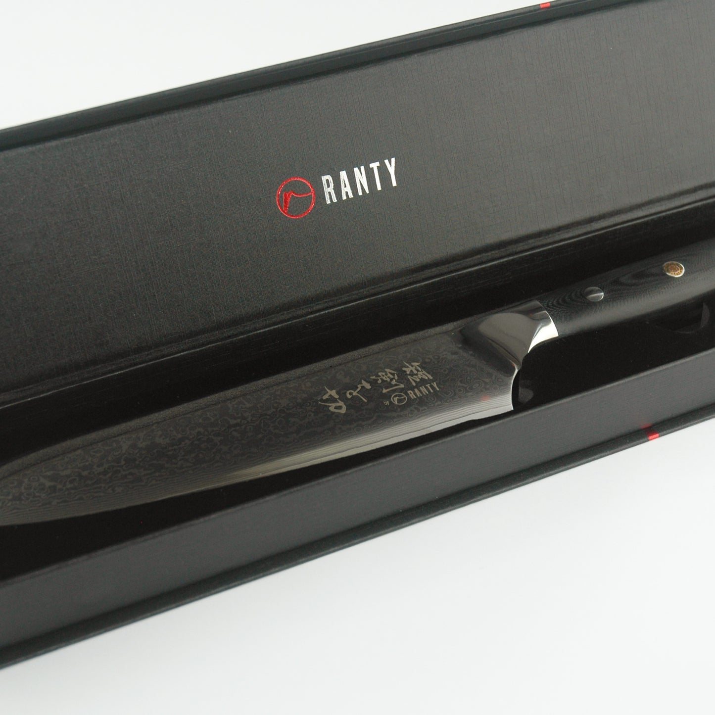 Cuchillo de acero de Damasco Grand Chef Ranty 20cm en empaque negro premium con logo.