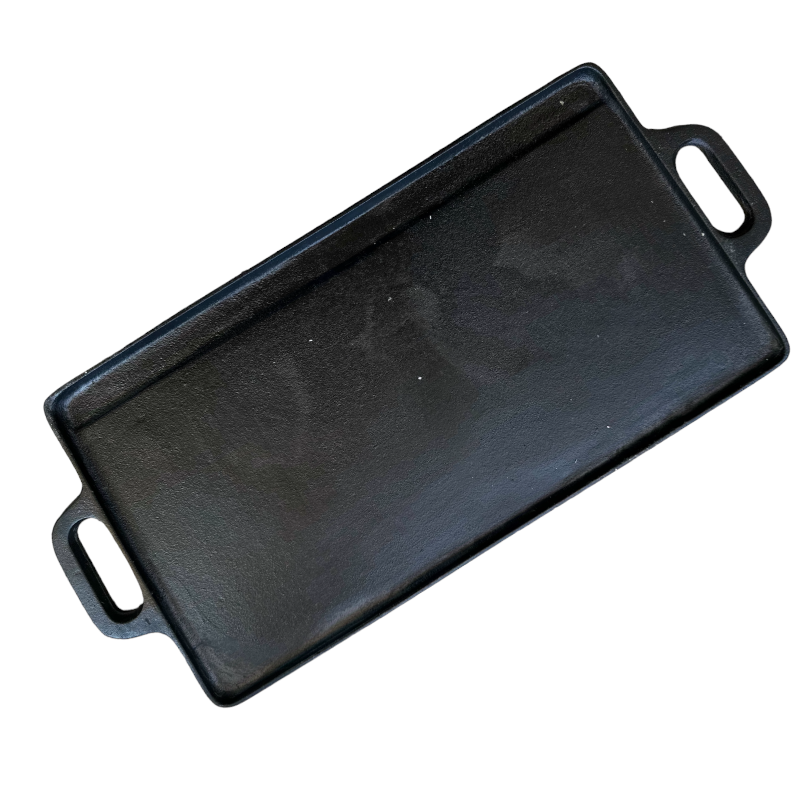 Plancha de hierro fundido Ranty lado liso, ideal para cocinar verduras y pescados, con asas laterales resistentes